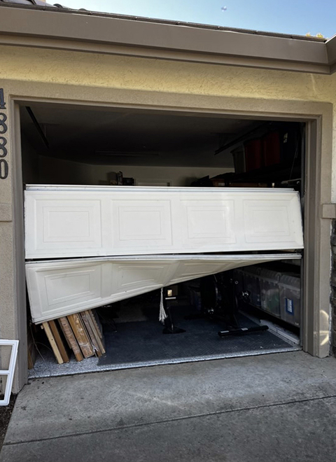 fix garage door off track