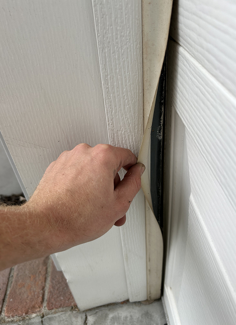 replace garage door weather stripping